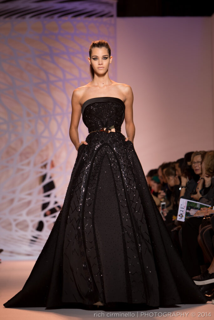 Model in a voluminous black Zuhair Murad gown at Paris Haute Couture Fashion Week 2014, photographed by Rich Cirminello.