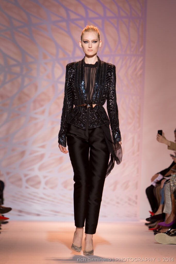 Model in a tailored black Zuhair Murad ensemble with sequin details at Paris Haute Couture Fashion Week 2014, photographed by Dallas-based photographer Rich Cirminello.