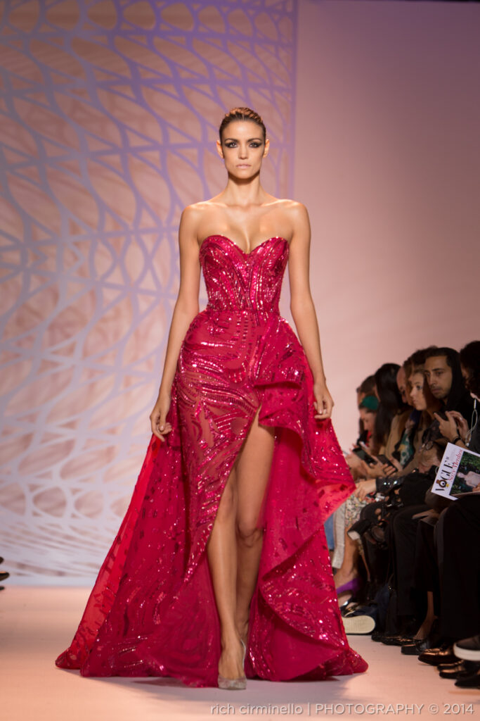 Model in a sparkling fuchsia Zuhair Murad gown at Paris Haute Couture Fashion Week 2014, photographed by Rich Cirminello