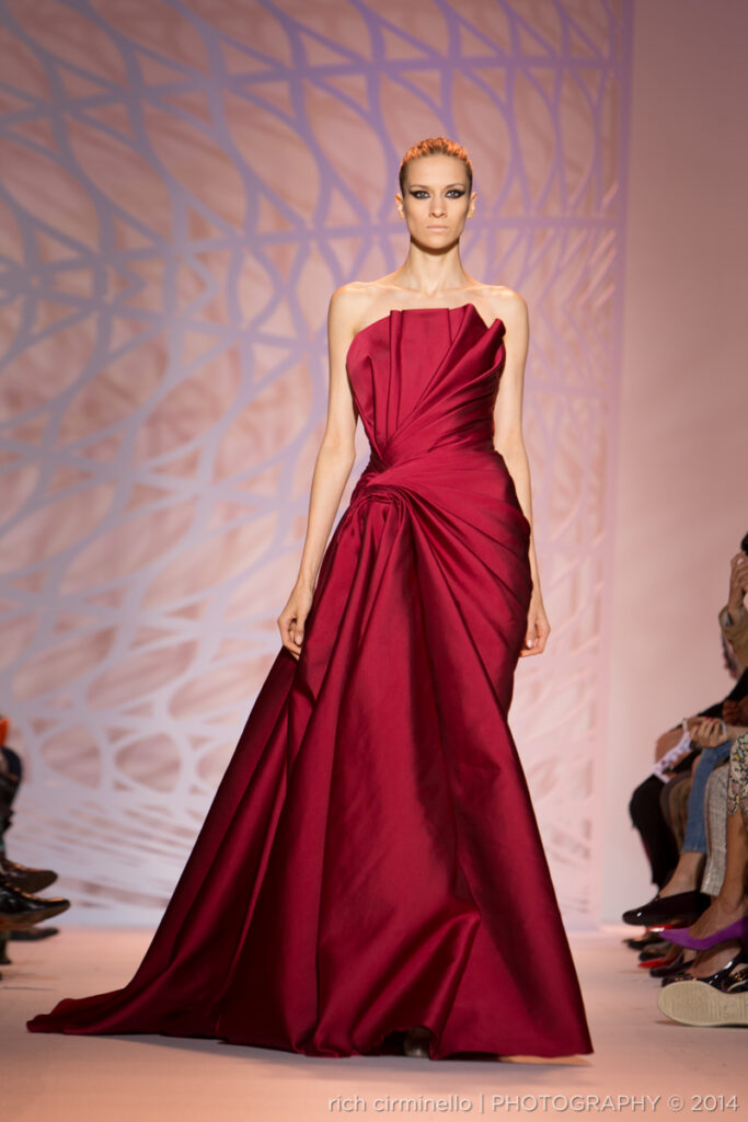 Model wearing a deep red Zuhair Murad gown at Paris Haute Couture Fashion Week 2014, photographed by Rich Cirminello.