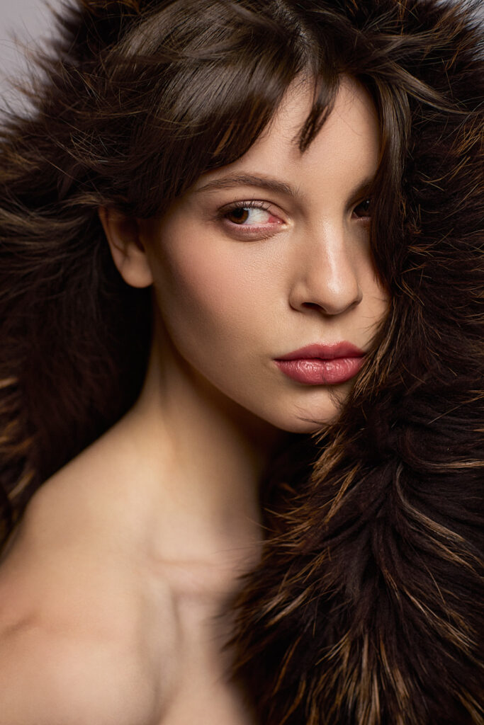 Dallas photographer portrait of a beautifiul woman woman with a fur
